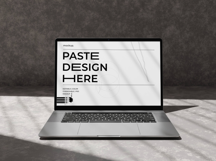 laptop in screen written as paste design here